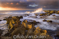 Sunset on the North Shore Oahu Hawaii.  by Rob Van Orden 